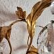 Hand-forged wall lamp gilded with gold leaf and crystals, Italy