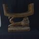 Togolese ethnic stool in carved exotic wood.