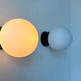 Pair of vintage Raak opaline and Bakelite wall lights, Netherlands 1970s
