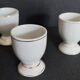 Porcelain egg cups with rooster decoration, set of three