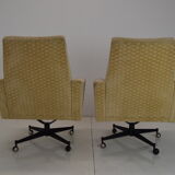 Pair of mid-century swivel armchairs with wheels 1970's