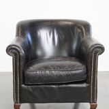Black grained cowhide leather armchair