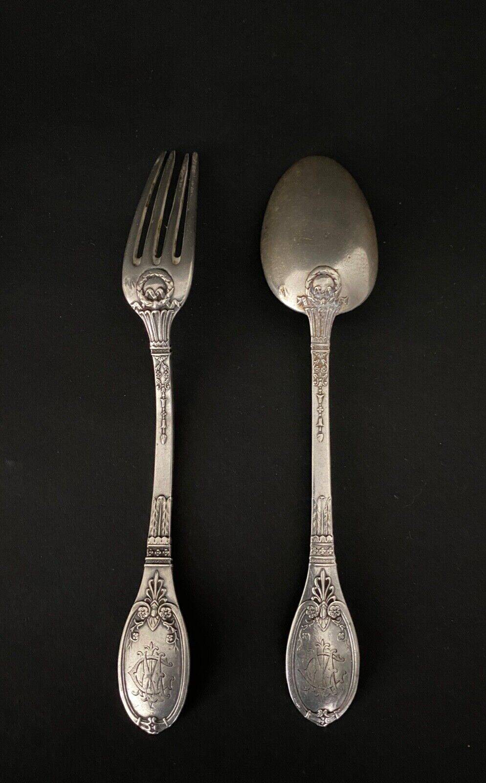 Pair of Gorini silver cutlery, Empire style, Minerva hallmark and richly decorated monogram