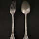 Pair of Gorini silver cutlery, Empire style, Minerva hallmark and richly decorated monogram