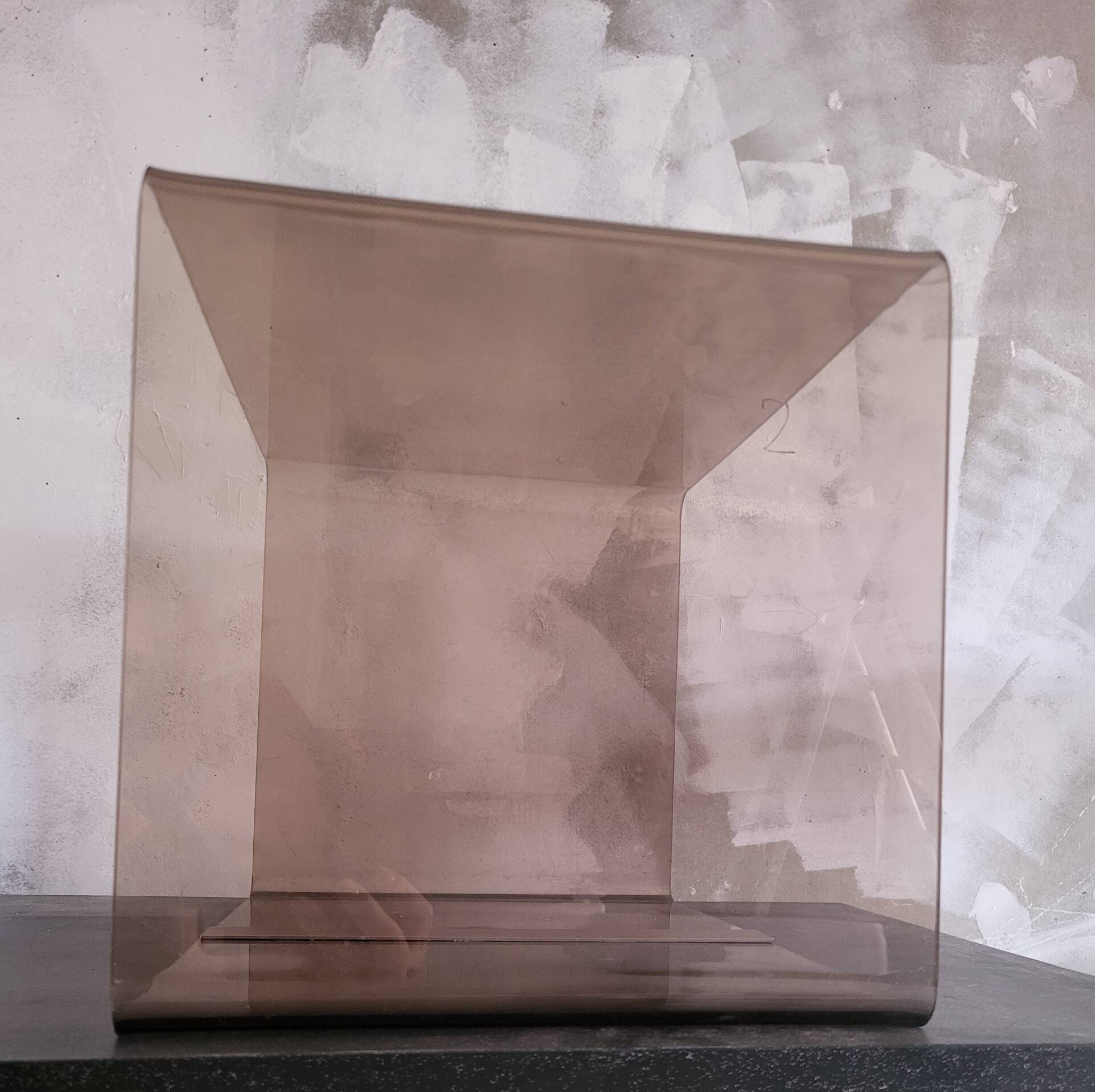 Rectangular piece of furniture or coffee table in smoked plexiglass by Michel Dumas.