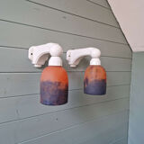 Pair of Art Deco wall sconces in multicoloured porcelain and frosted glass.