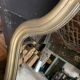 Antique bevelled baroque mirror in patinated wood
