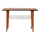 Vintage Scandinavian coffee table in teak with brass shelf
