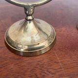 Triode of mother-of-pearl and brass candlesticks