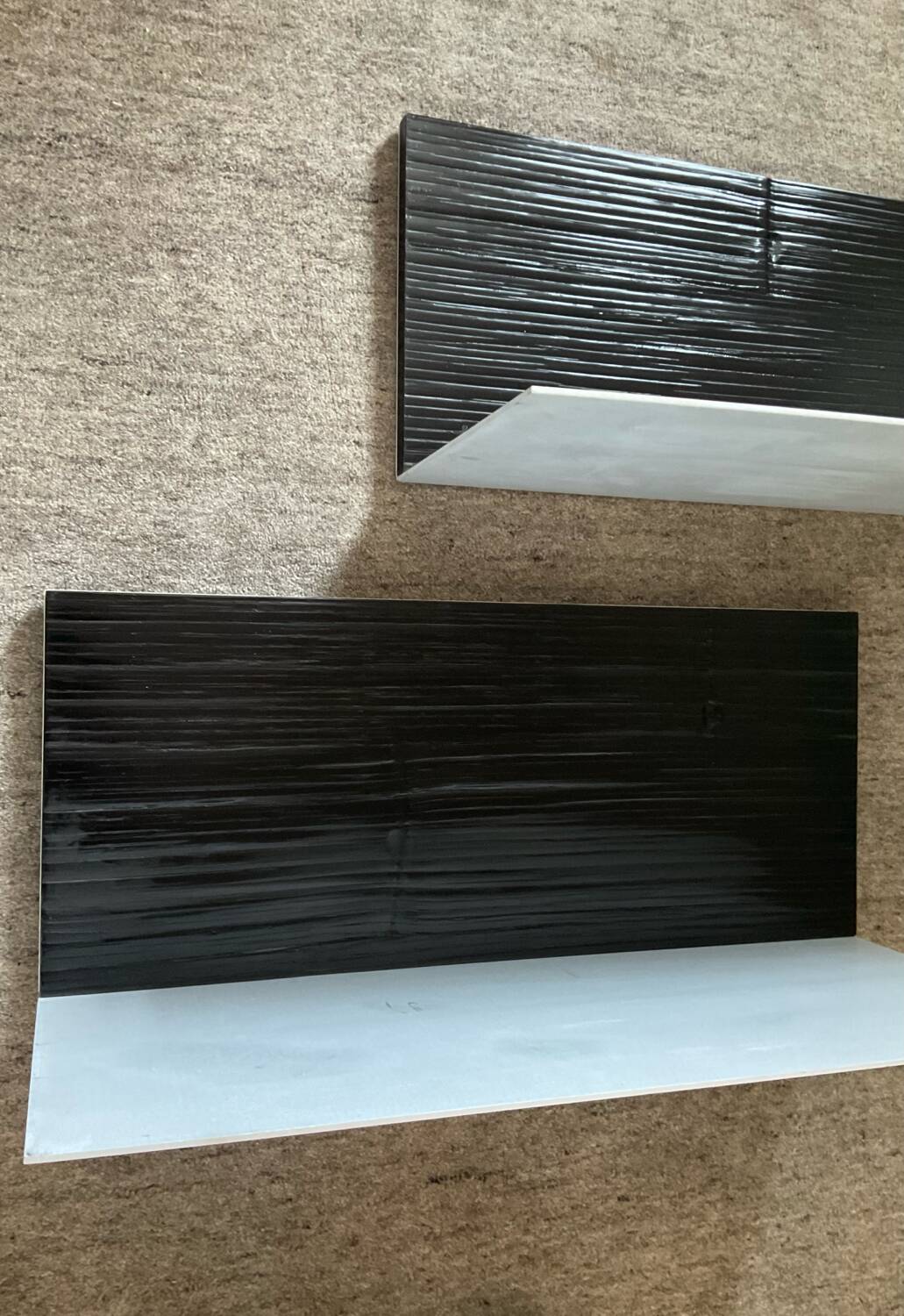 Pair of contemporary shelves in steel and stained wood