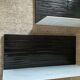 Pair of contemporary shelves in steel and stained wood
