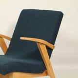 Fauteuil vintage scandinave bleu marin bouclé design moderne milieu siècle
