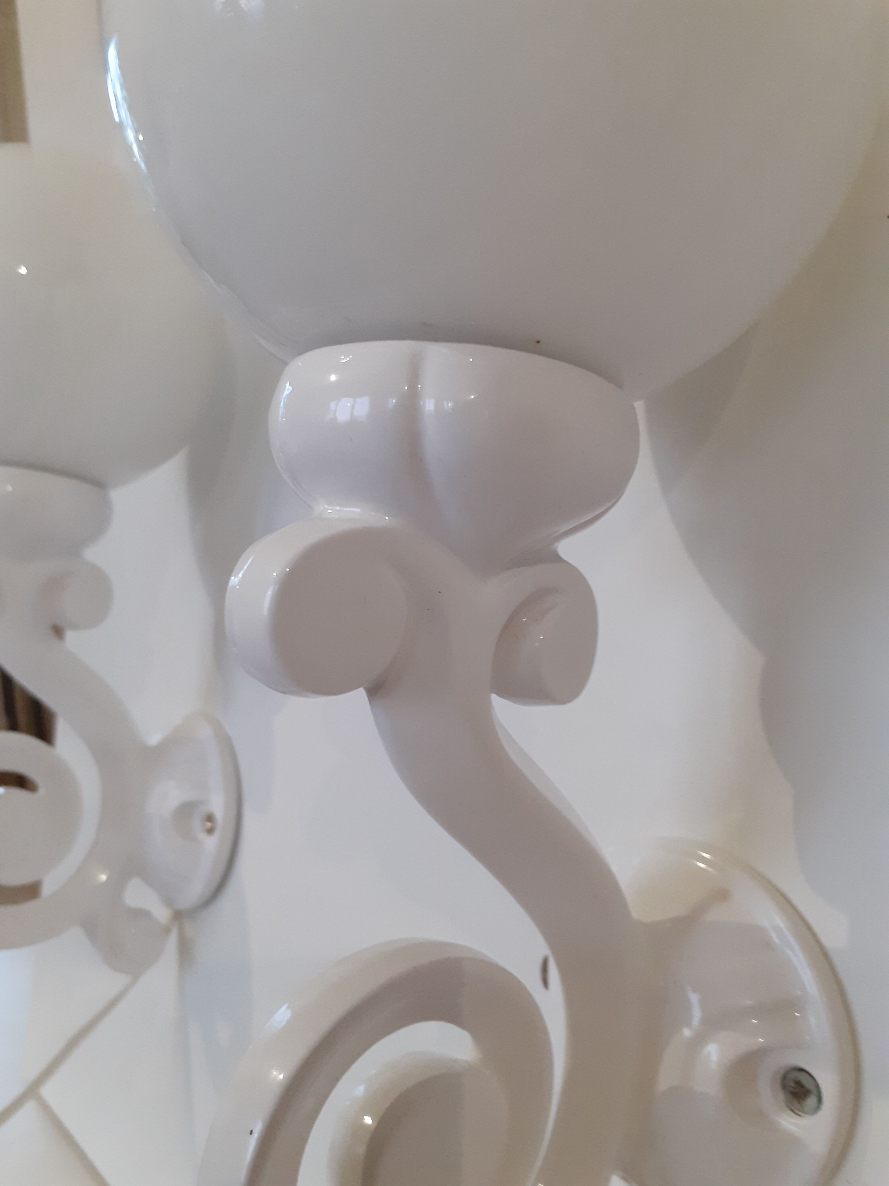 Pair of cast iron sconces