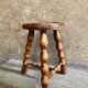 Tabouret tripode bois à entretoise vintage