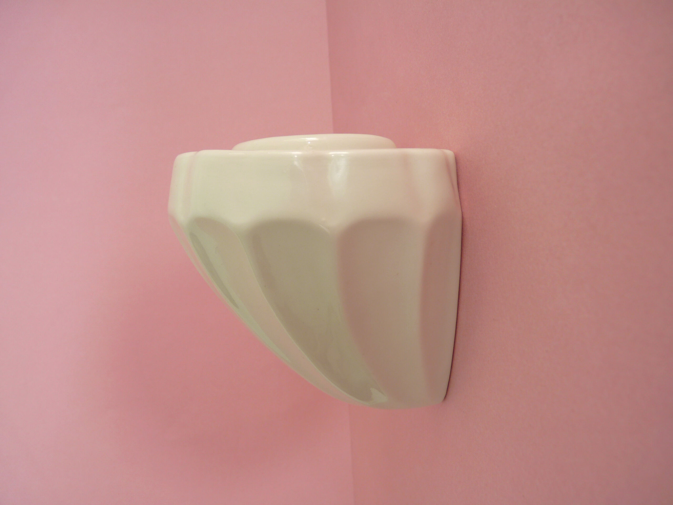 Old wall toothbrush holder or antique pencil holder, old ceramic brush pot