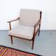 Vintage teak lounge chair, retro 1960s–70s style.