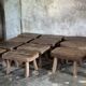Small stool, rectangular solid teak side table with curved legs.