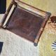 Small antique library in varnished dark oak rattan.