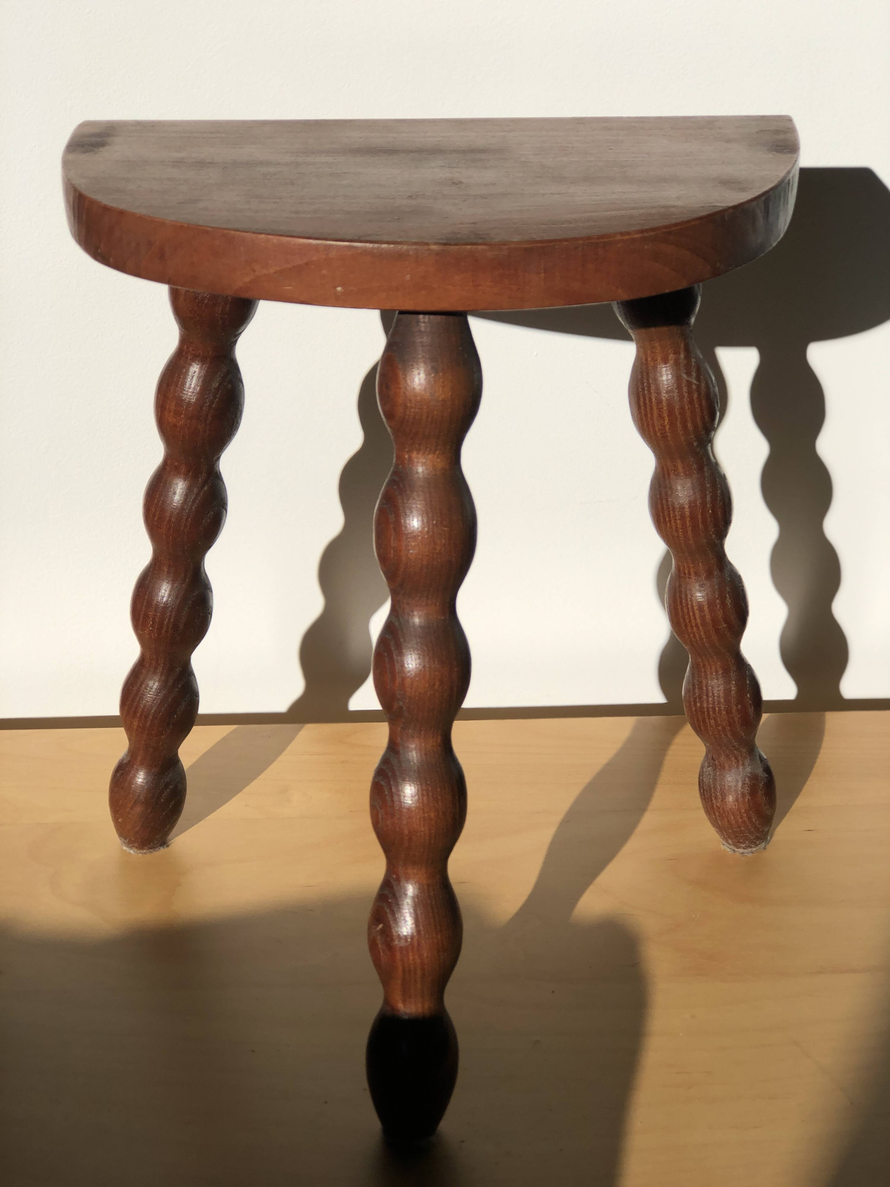 Turned wooden tripod stool