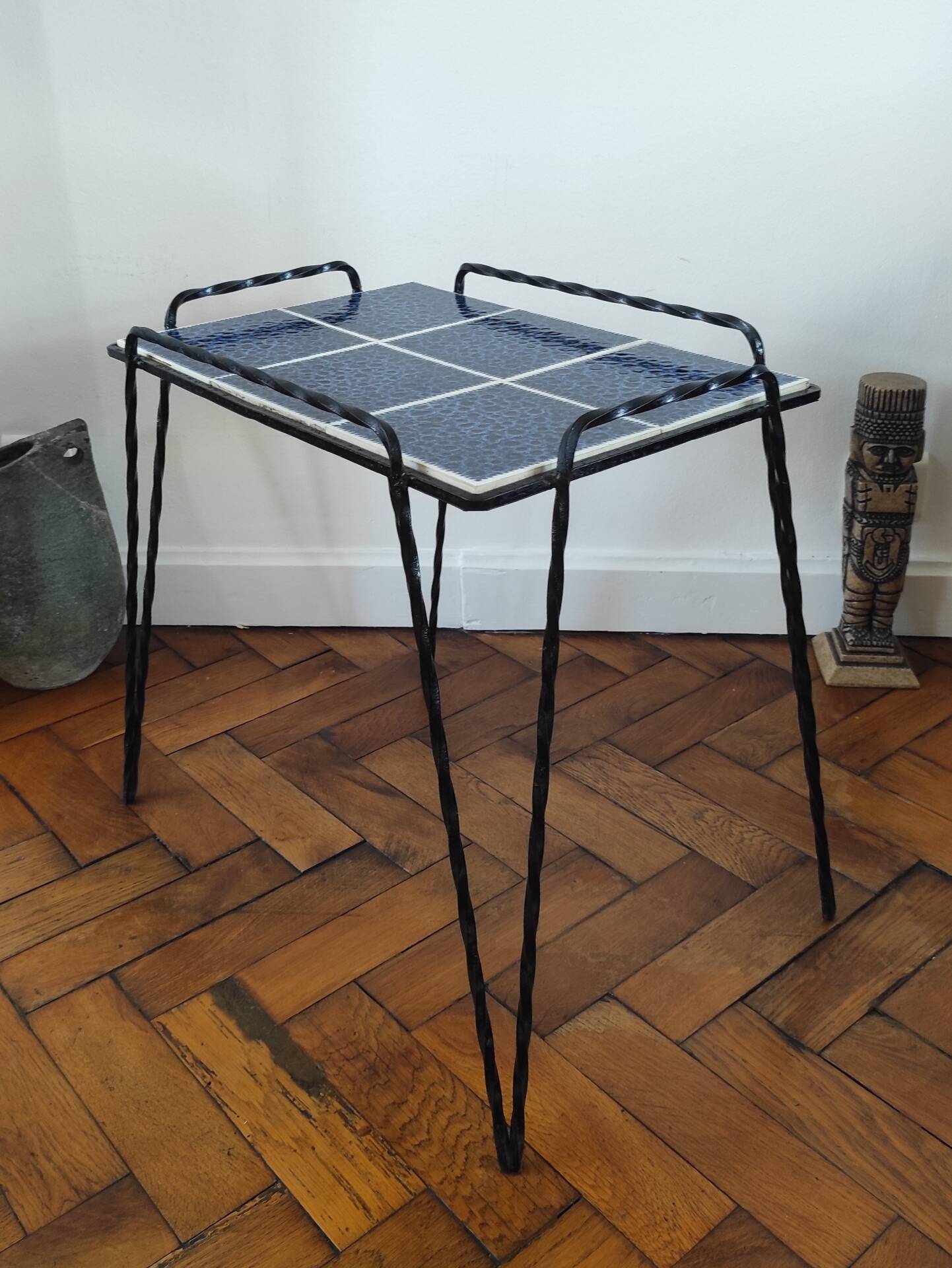 Vintage side table in twisted wrought iron and glazed ceramic.