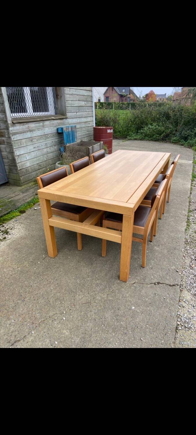 6 wooden chairs and faux leather