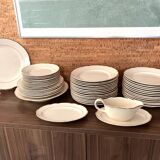 Service of 53 pieces of plates and dishes by Villeroy & Boch in cream and gold, model Saar.