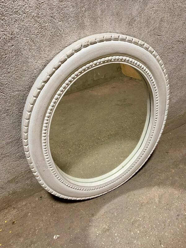 Oval white mirror