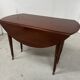 A six-foot Louis XVI style mahogany table from the 19th century.