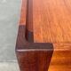 Mid-century teak and walnut side table, 1960s.