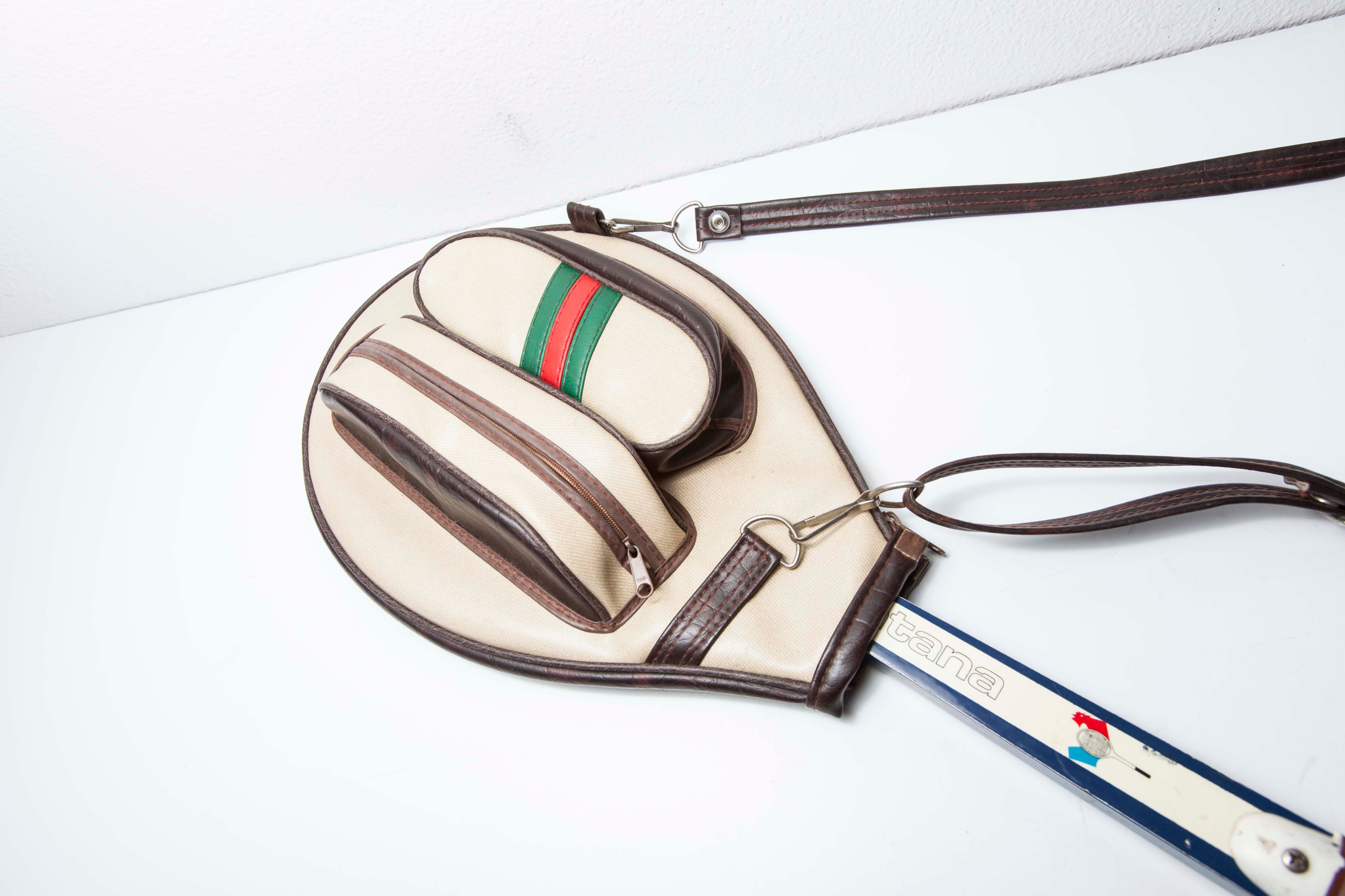 Blue Montana M505 racket with leather bag