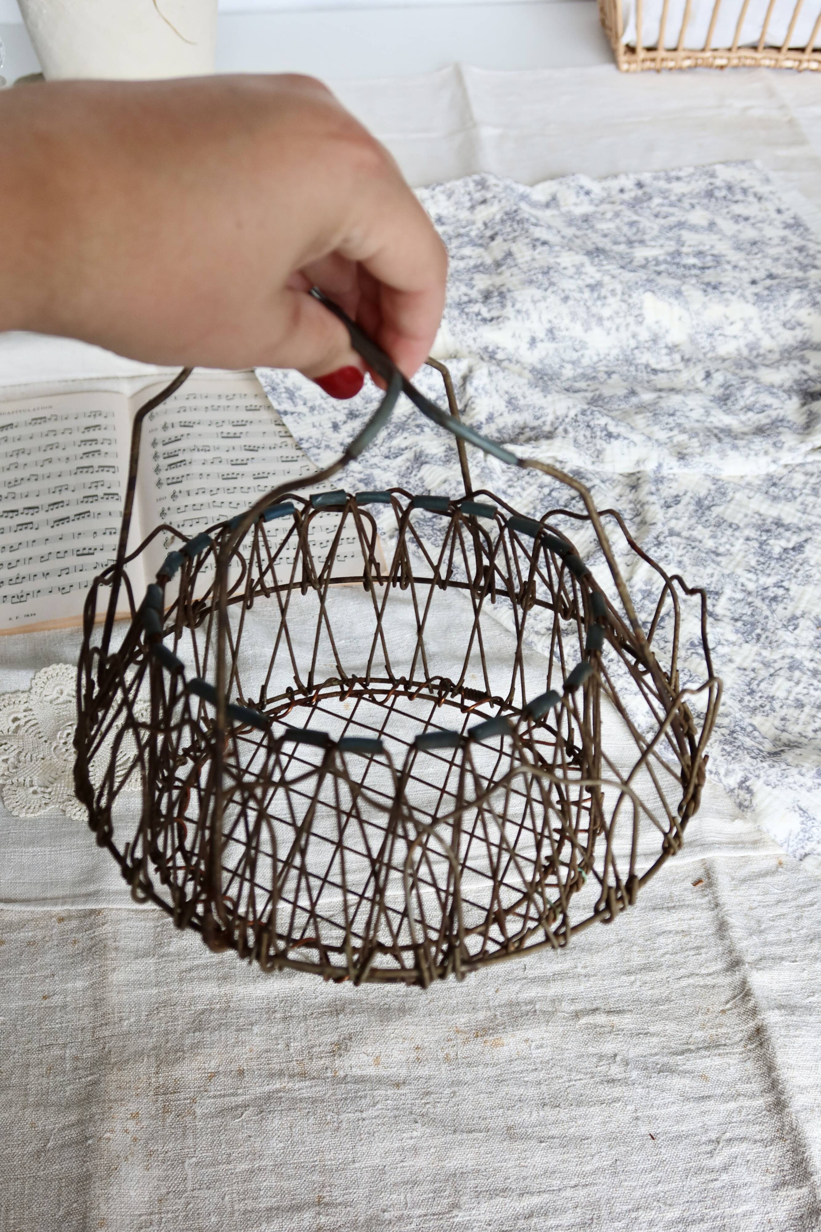 Vintage foldable metal basket in the shape of a flower