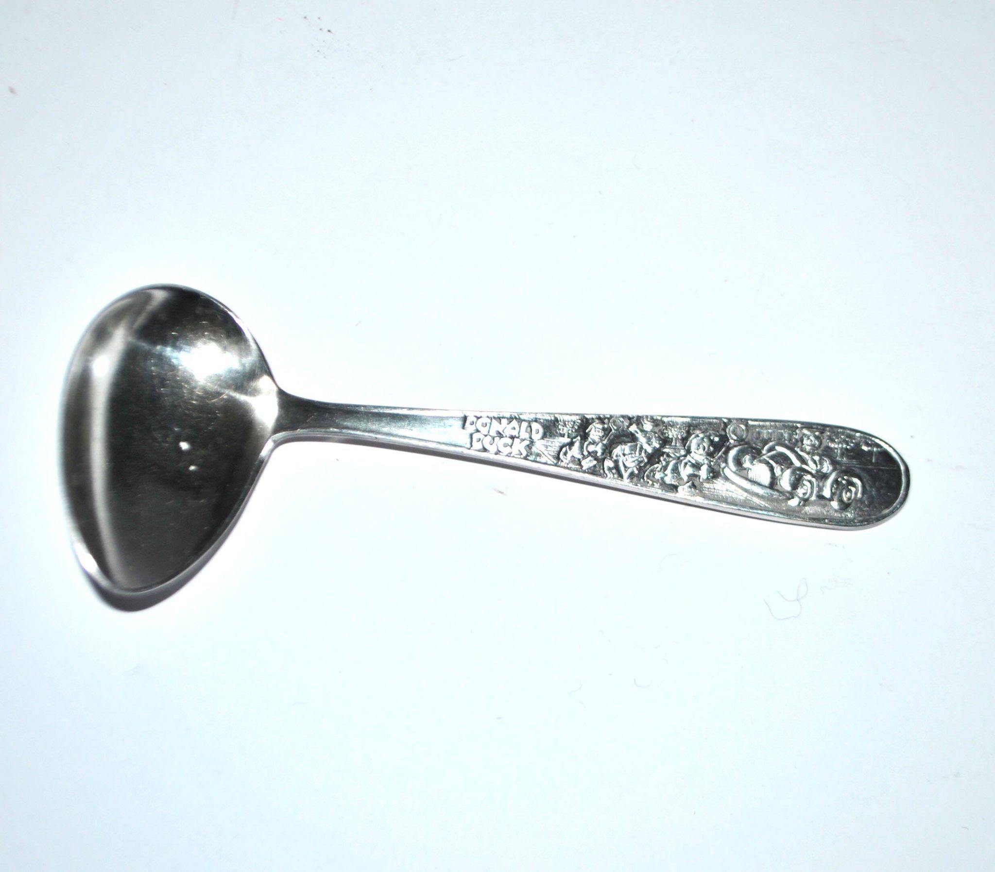 Vintage silver-plated metal porridge spoon, Donald Duck cutlery for children