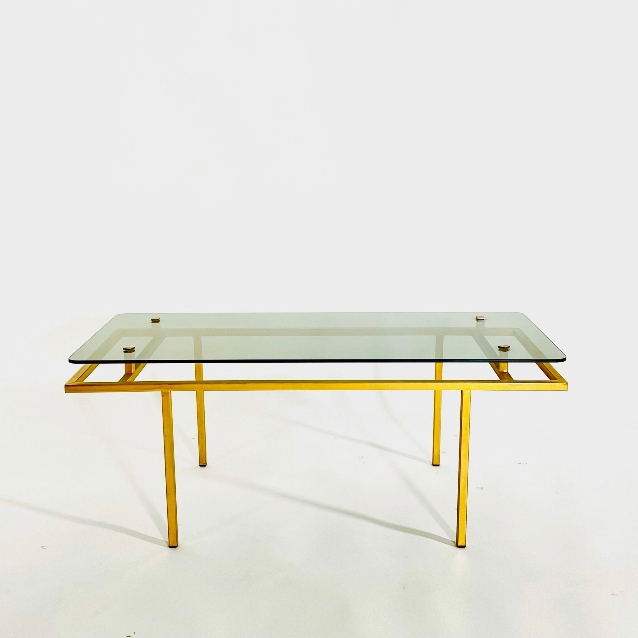 Brass coffee table and smoked glass, France 1960's