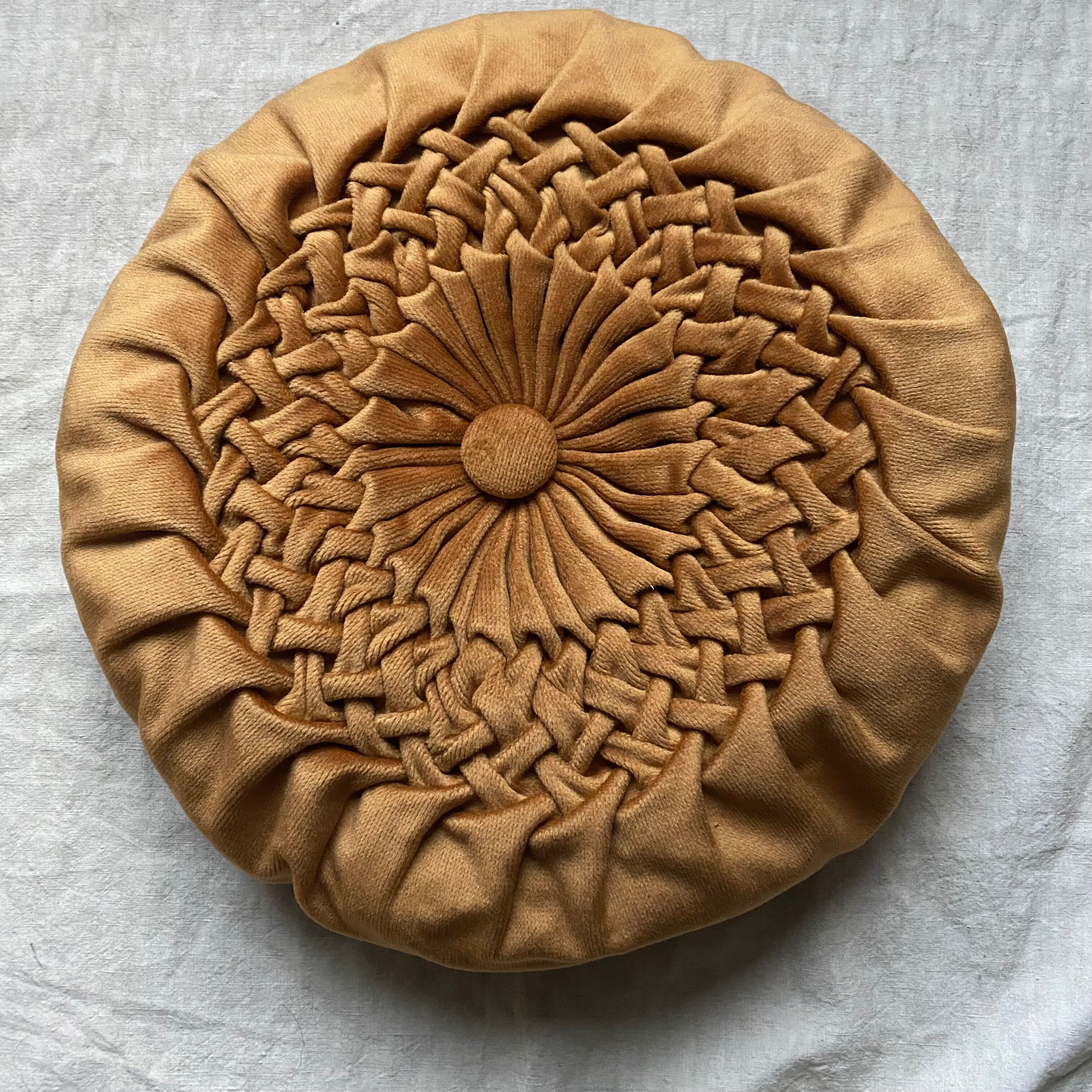Vintage round cushion in pleated velvet