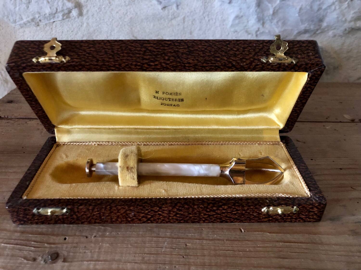 Sugar or ice tongs in their case