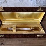 Sugar or ice tongs in their case