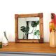 Woven bamboo mirror in natural tone