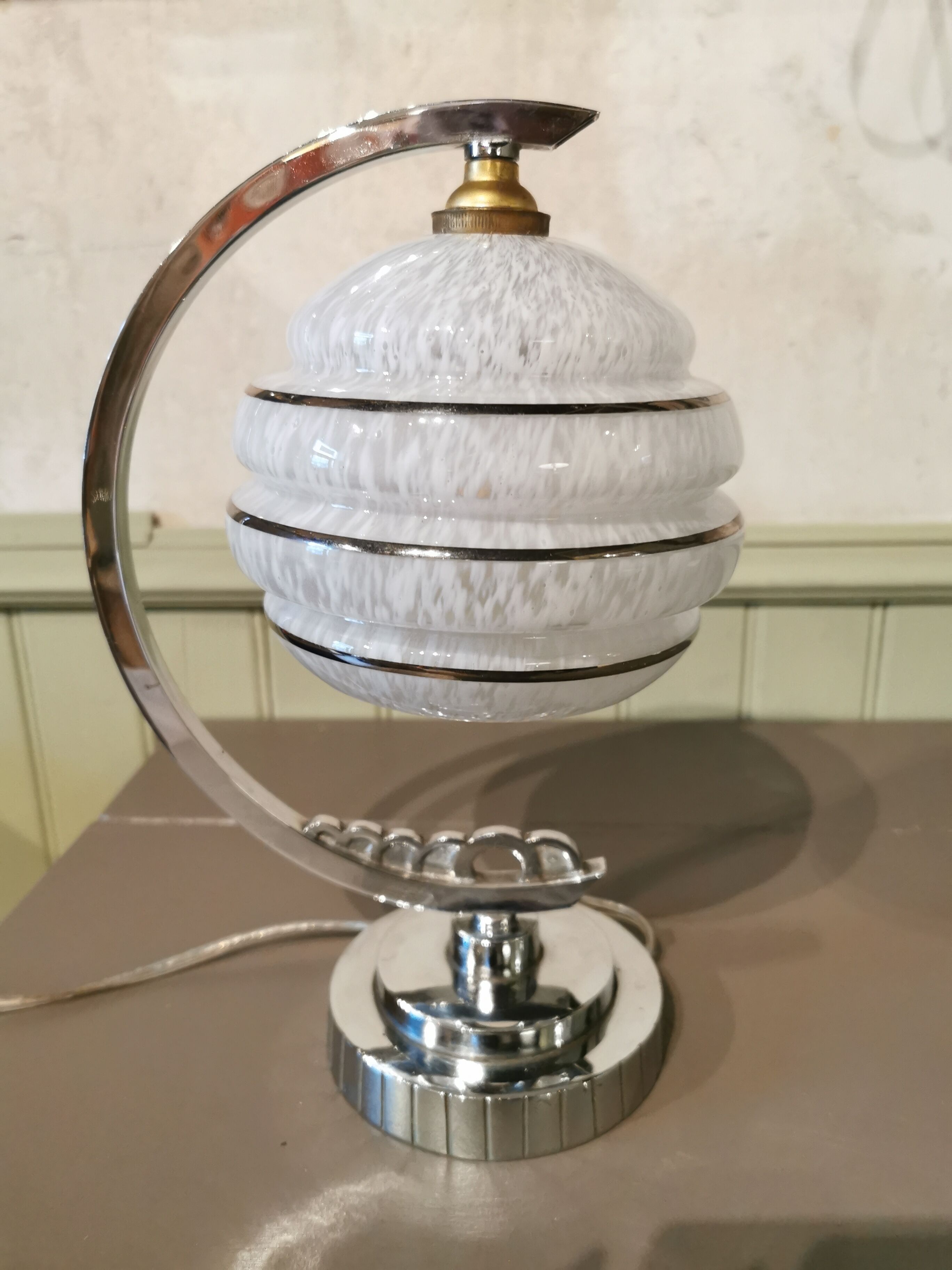 Half-moon chrome art deco lamp