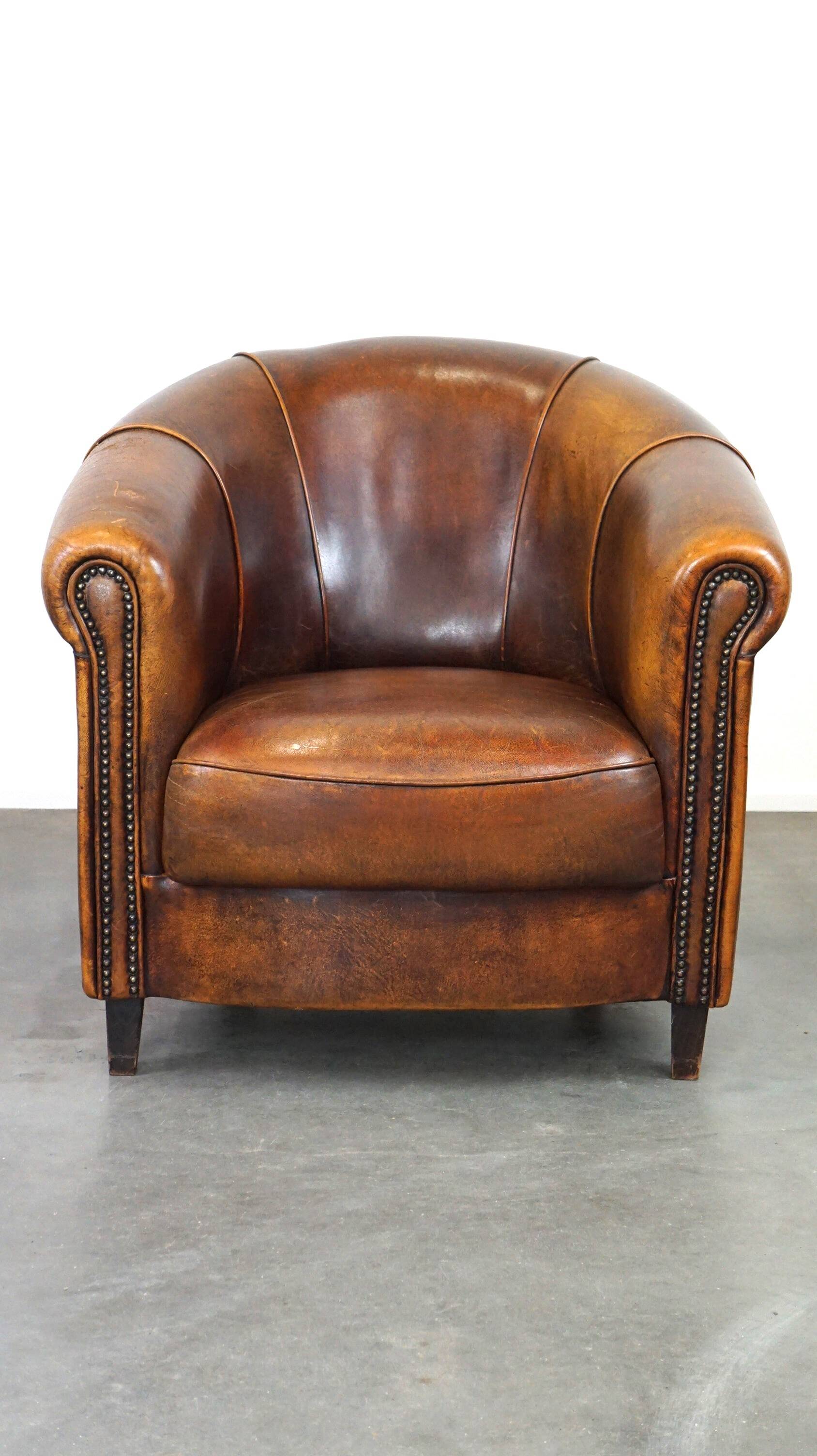 Charming, classy, and comfortable sheepskin leather club armchair