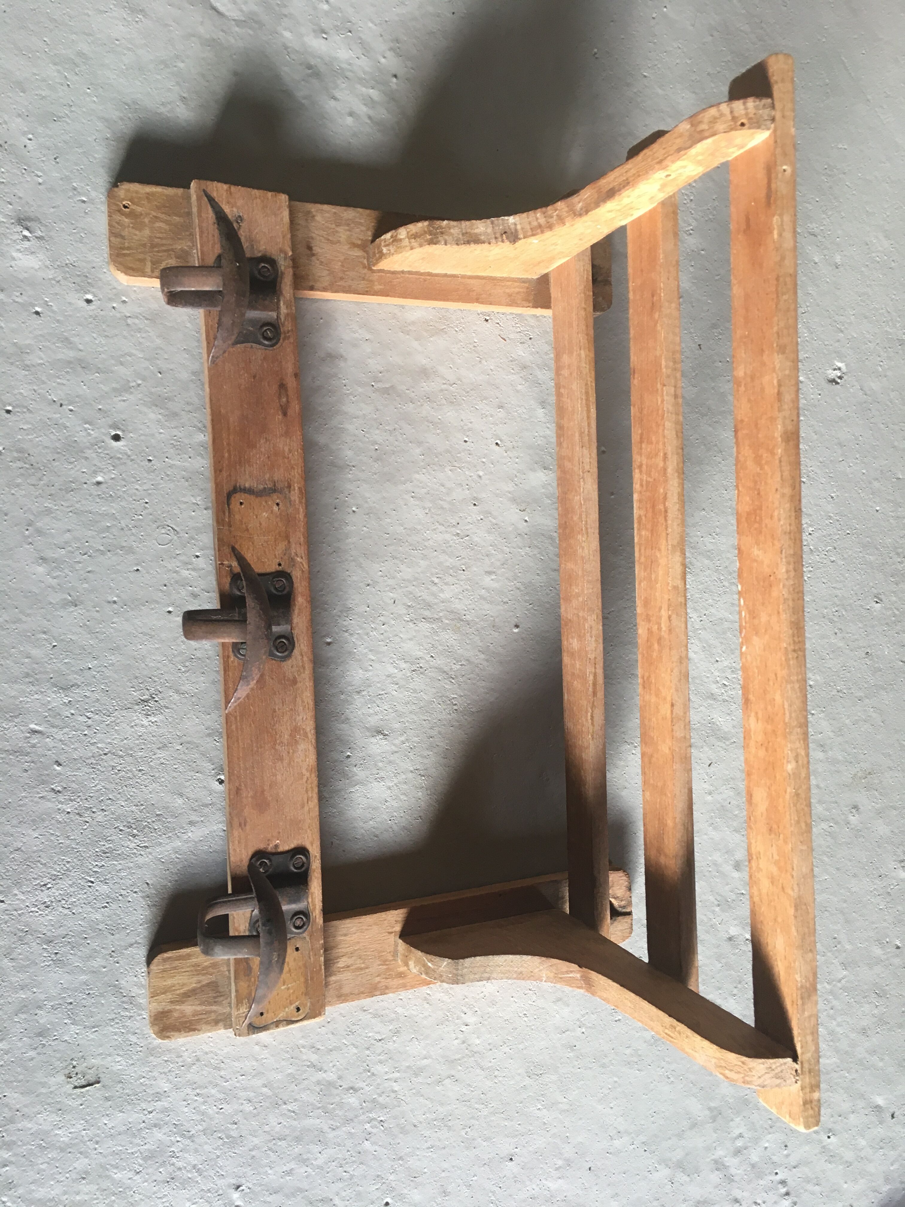 Wood shelf and metal hooks