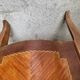 Curved chest of drawers in rosewood and marble marquetry