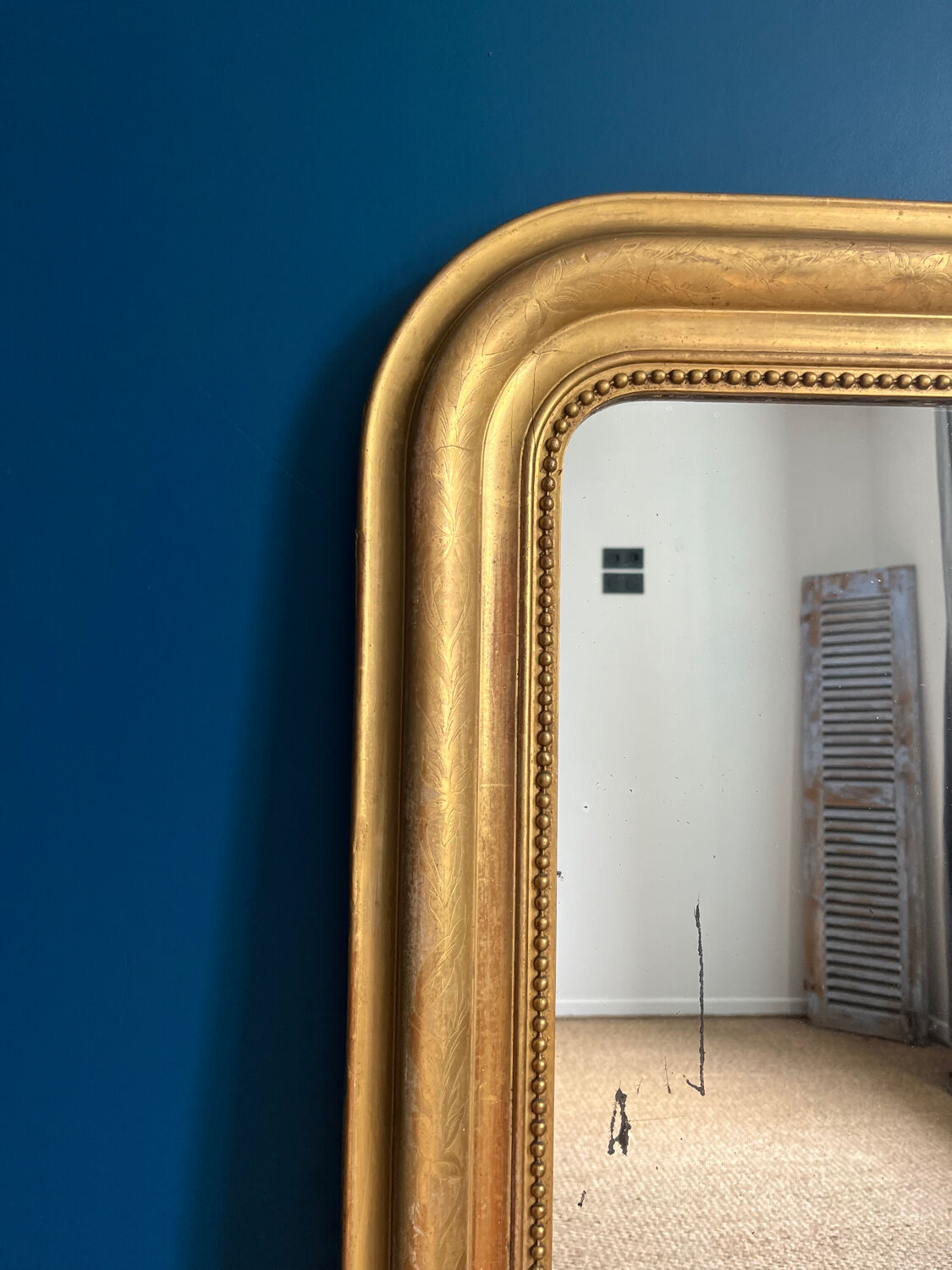 Old mirror Louis-Philippe beaded 128cm/95,cm gilded with gold leaf