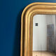 Old mirror Louis-Philippe beaded 128cm/95,cm gilded with gold leaf