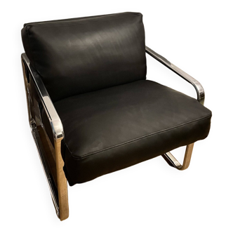 Black faux leather armchair