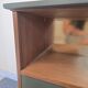 Renovated vintage bedside table in wood, with tapered legs – Matt green & gold background