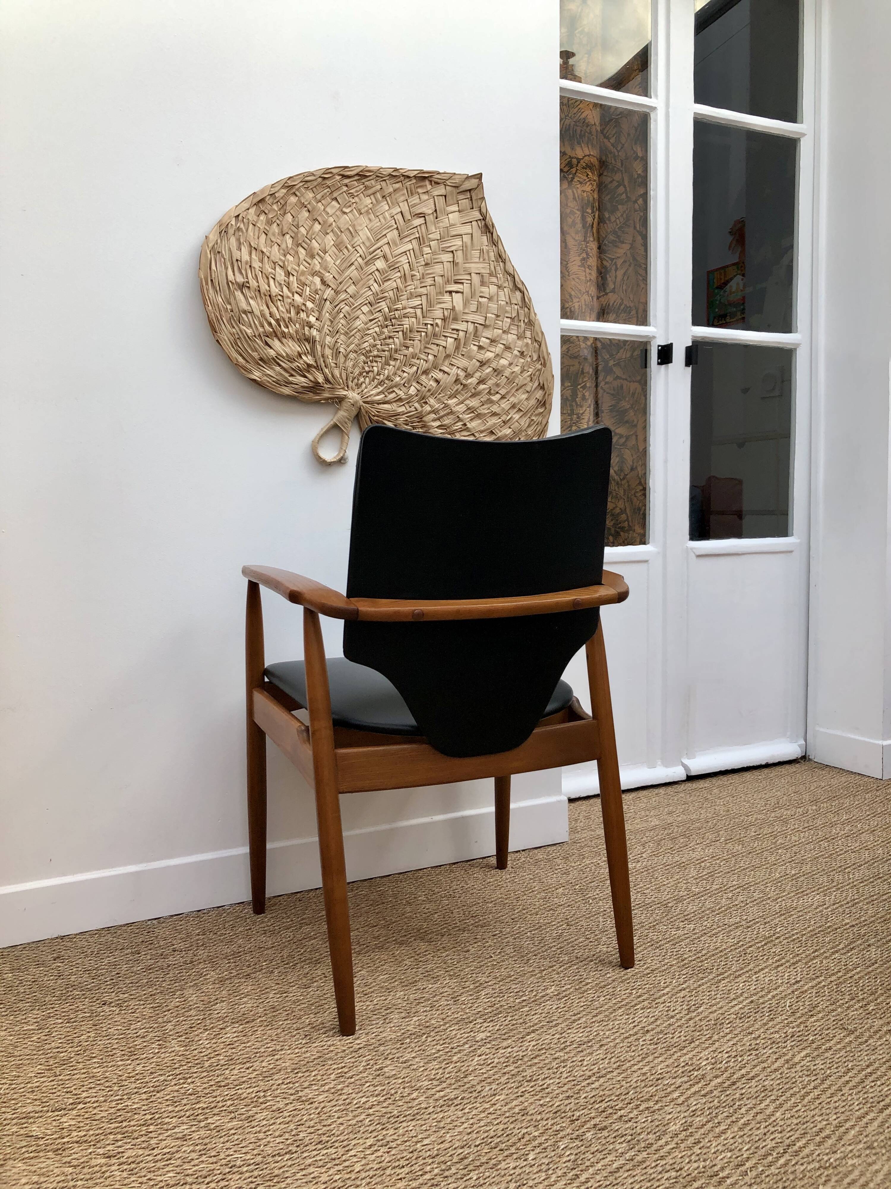 Teak and black vinyl chair 1960s