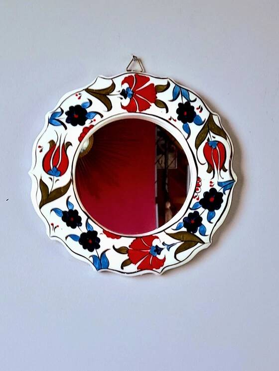 Flowered ceramic mirror