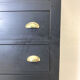 Blackened wooden chiffonnier and varnished top