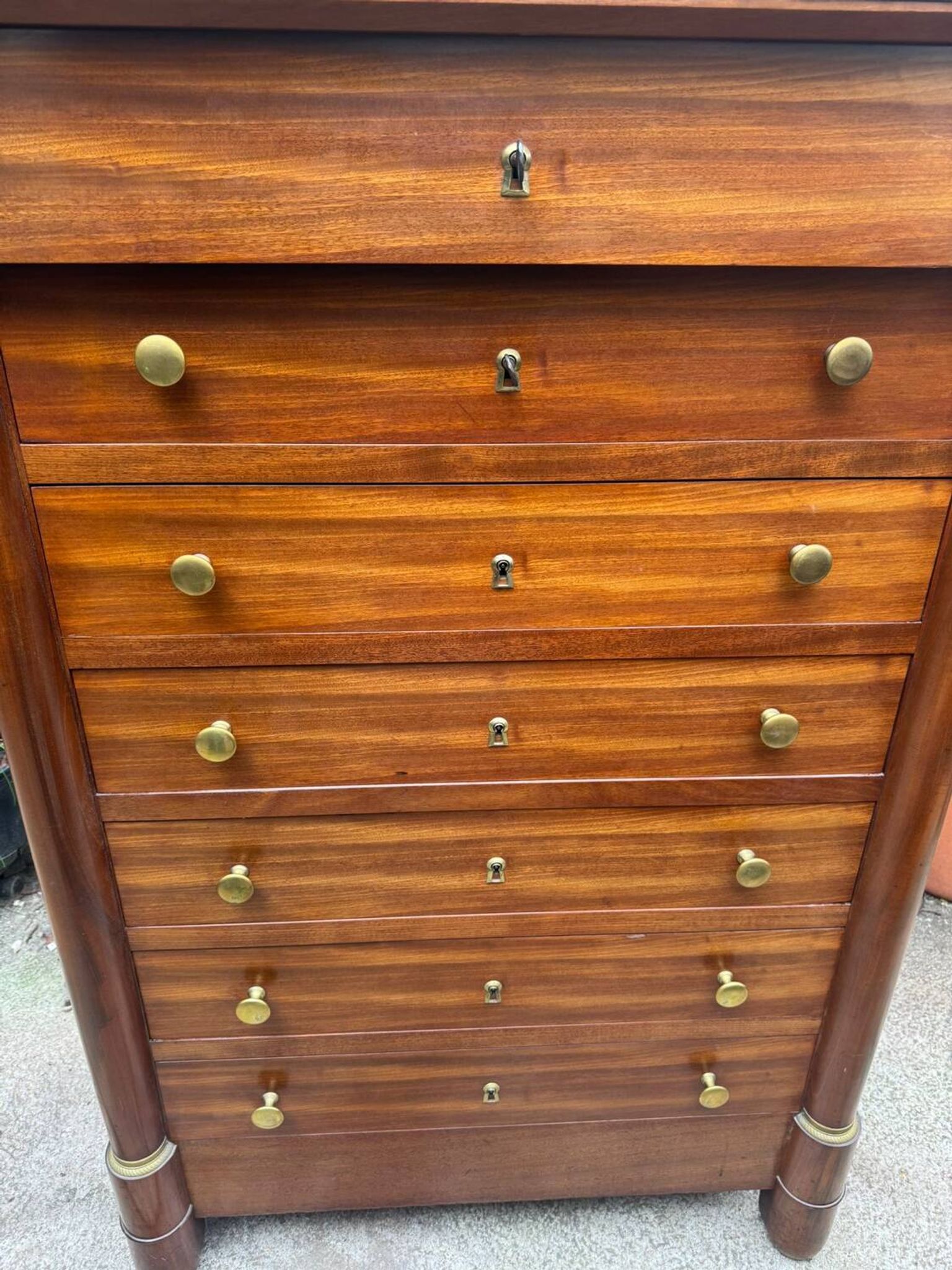 Empire chest of drawers in mahogany and black marble, 19th century