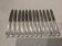 12 silver-plated dessert knives by the silversmith Ercuis, Senlis, 20.3 cm.